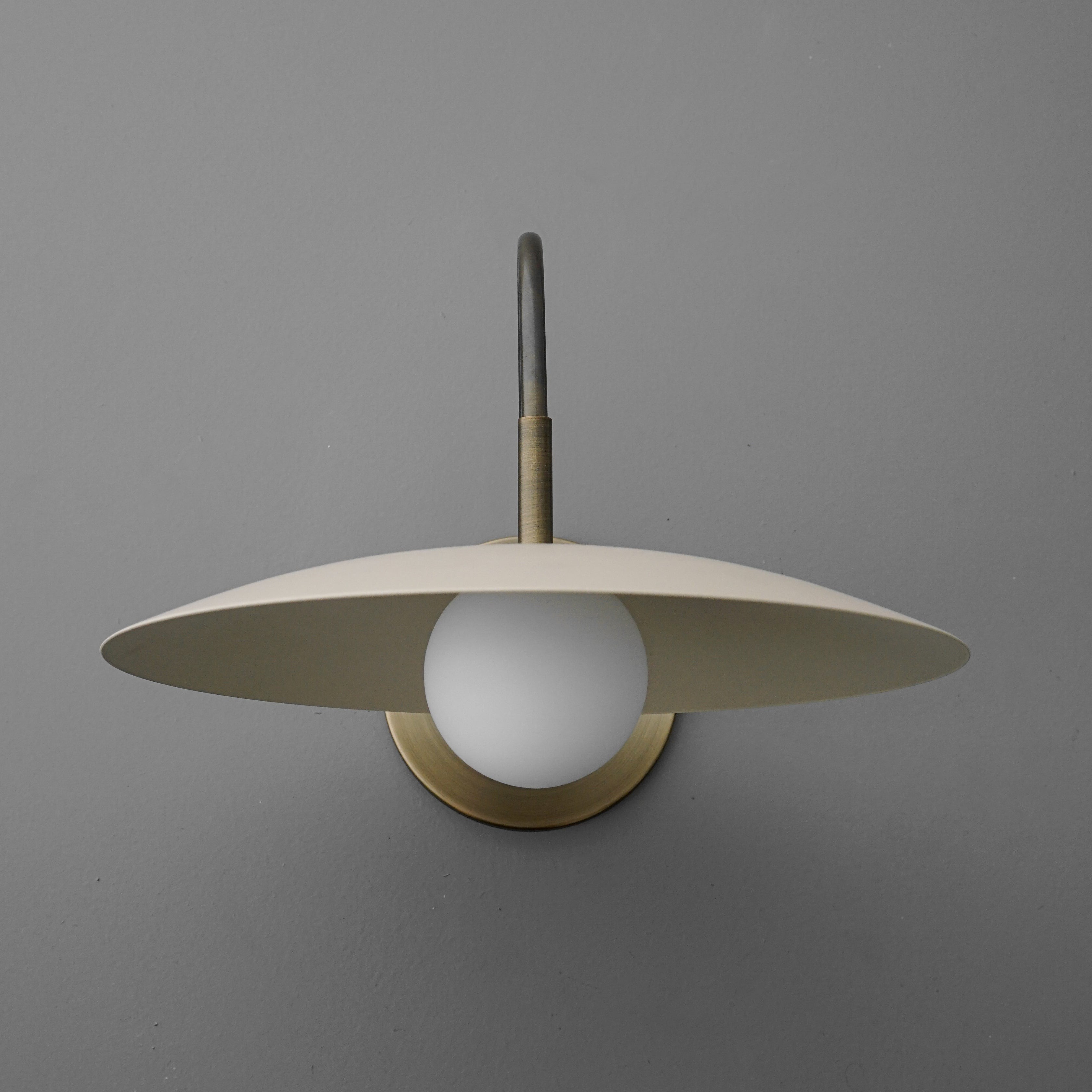Curva Metal Modern Wall Sconce - Antique Brass Arm with Cream Disc Shade T409
