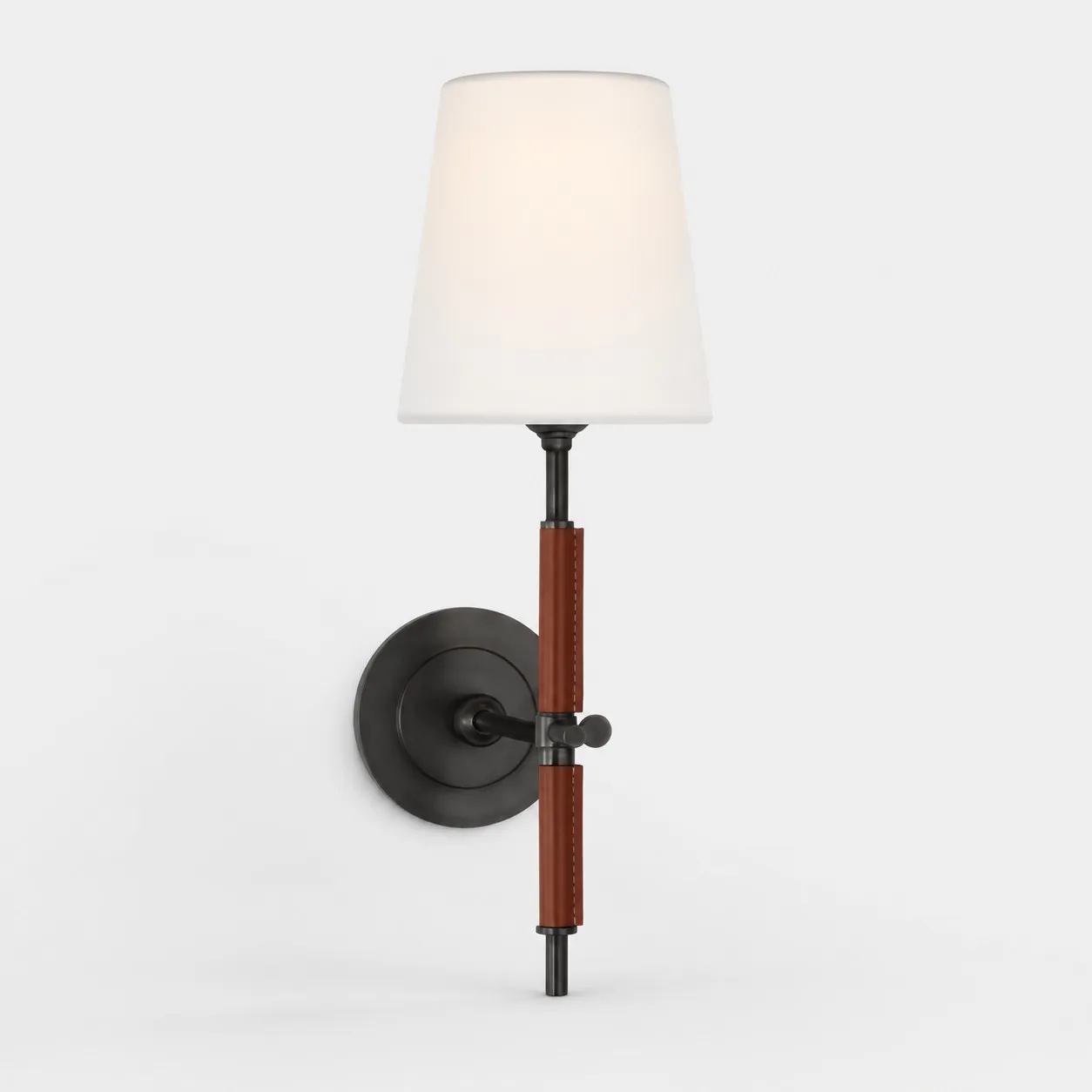 matte black wall sconce with brown leather and white fabric shade