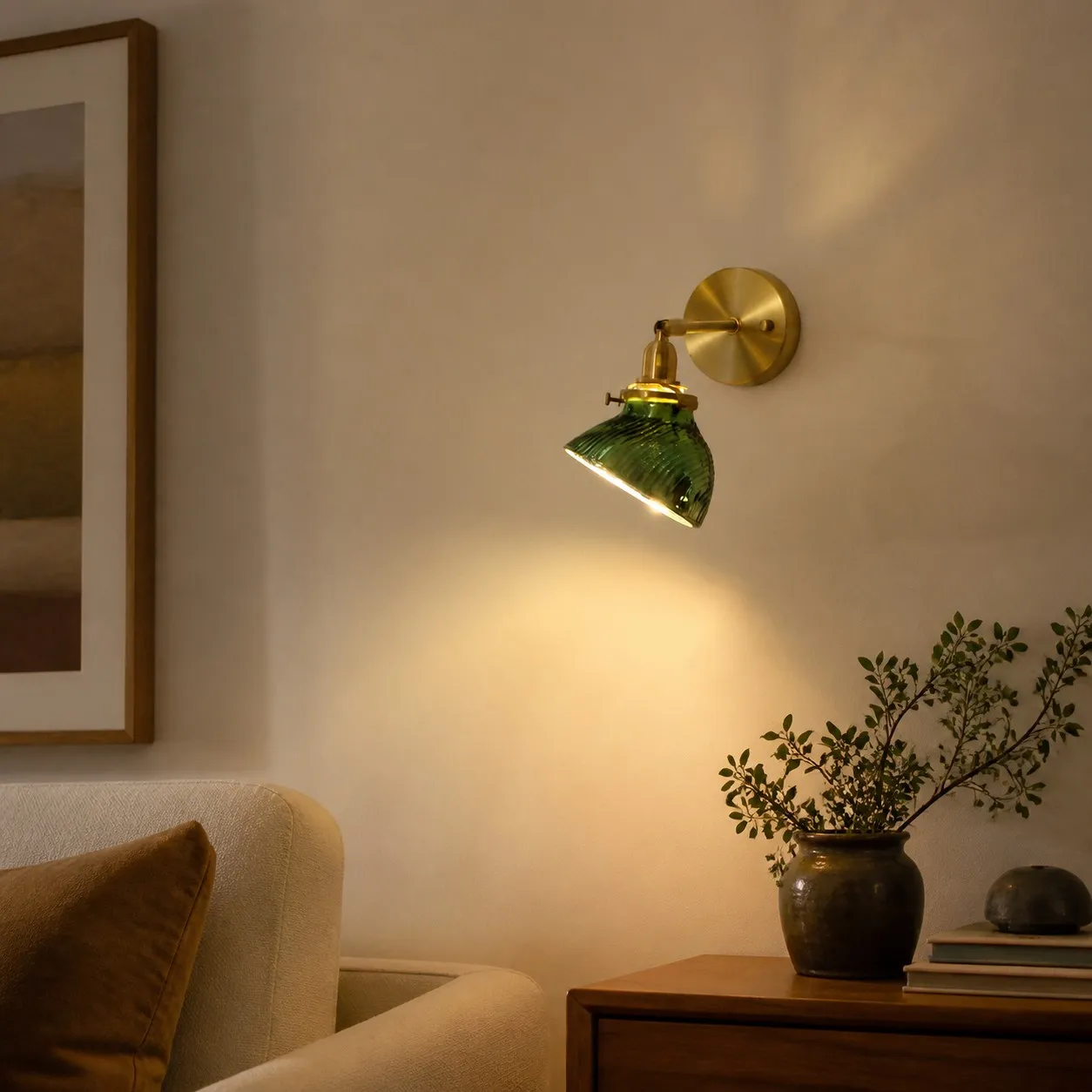Green glass bedside wall lamp in a reading corner