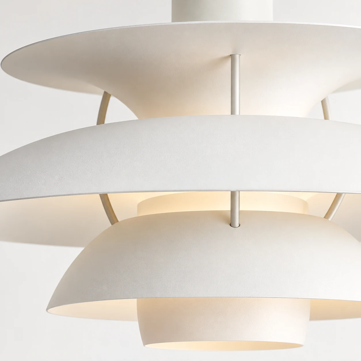 Close-up of layered metal pendant shade construction
