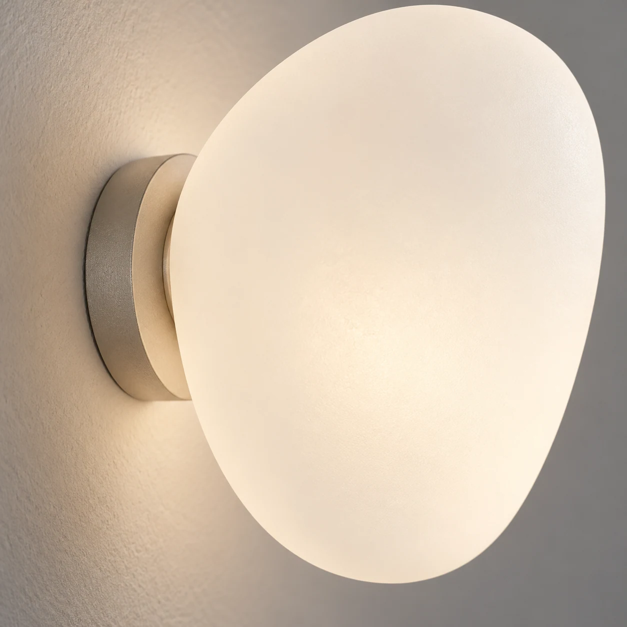 Close view of Stonea’s frosted-glass shade and mounting detail